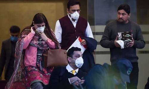 US official with virus symptoms arrives; Kyrgyz national tests positive