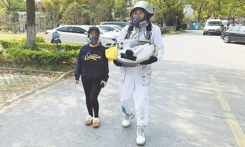 Chinese man builds &lsquo;baby pod&rsquo; to protect infant from virus