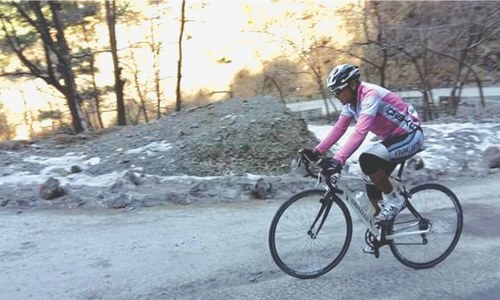 CYCLING: PEDALING UPHILL ON FLATTENED TYRES