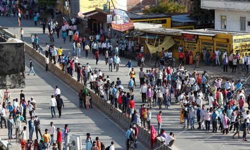 Outrage in India as migrants sprayed with disinfectant to fight coronavirus
