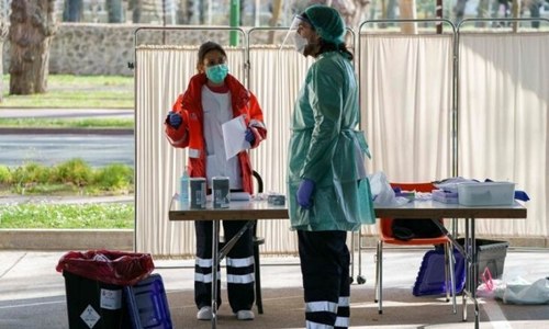 Spain&rsquo;s hospitals at breaking point, US cities brace for onslaught