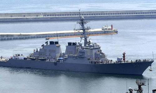 US warship heads to port after virus outbreak