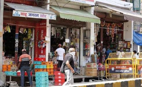India opens few stores as virus restrictions ease in some countries