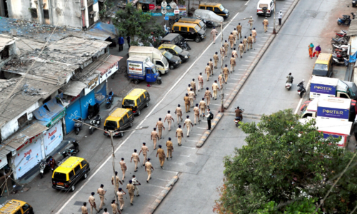 Coronavirus spreads among Indian police enforcing world's largest lockdown