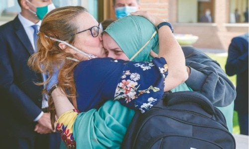 Freed Italian aid worker returns home on special flight