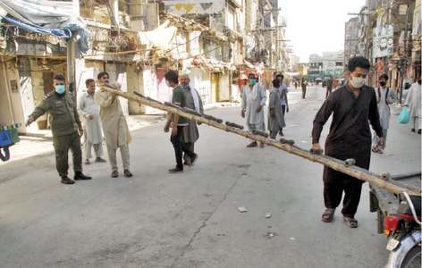 Pindi district admin seals markets, imposes fines for coronavirus SOP violations