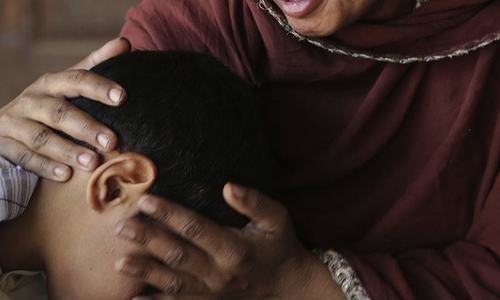 Two held for assaulting boy in Haripur