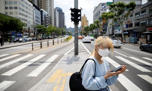 Spike in South Korea virus cases shows perils of reopening