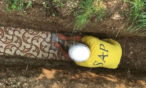 Italy unearths Roman mosaic after century-long hunt