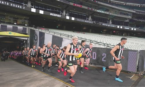 Australian Football League resumes with a thriller and anti-racism protest Australian Football League resumes with a thriller and anti-racism protest