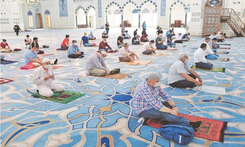 US, Europe battle fresh virus surges