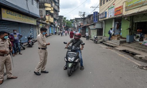 India locks down 125m as Spain honours virus victims