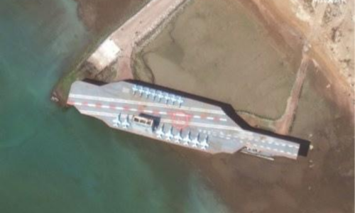 Iran moves mock aircraft carrier to sea amid US tensions