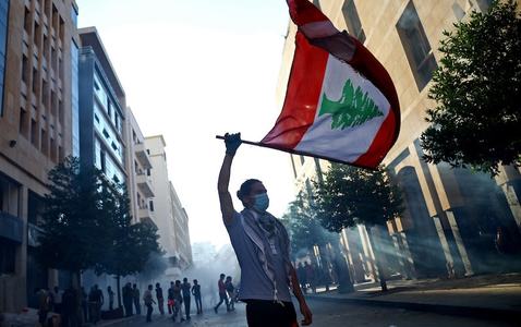 Lebanese PM resigns along with his government over blast fallout