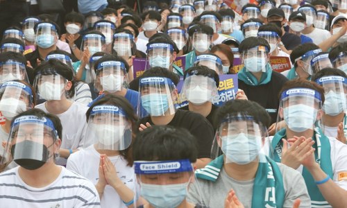 S. Korean doctors strike over training plan as virus cases spike