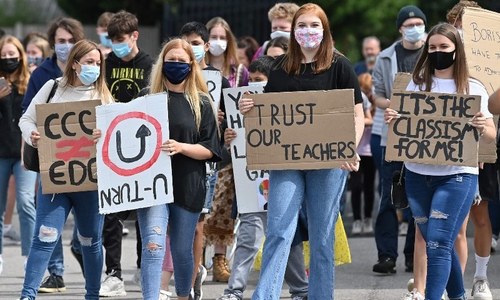 England's exams regulator reverses course after grading furore