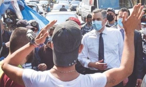 Lebanon designates new PM as Macron visits