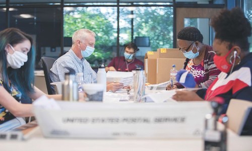 US vote-by-mail begins as White House drive turns ugly US vote-by-mail begins as White House drive turns ugly