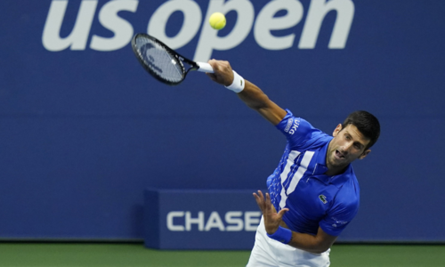 Djokovic reaches last 16 as bizarre delay shrouds US Open