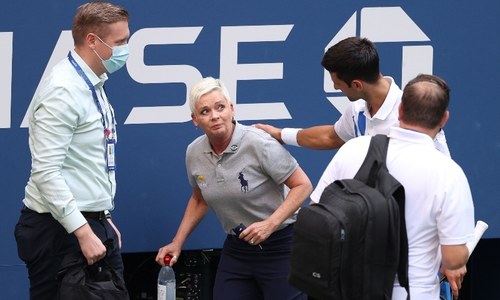 Novak Djokovic disqualified from US Open after accidentally striking line judge with ball