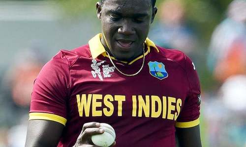 Treat racism like doping and fixing, urges Holder