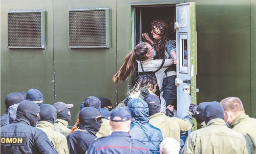 Belarus police detain women protesters Belarus police detain women protesters