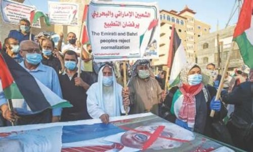 Palestinians take to streets against deals