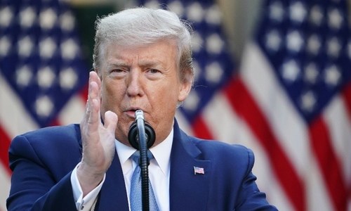 Twitter slaps warning label on Trump tweets Twitter slaps warning label on Trump tweets