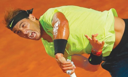 Djokovic behaves better in first match since US Open default