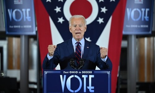 Pandemic politics: Biden shuns 'false promises' of fast fix