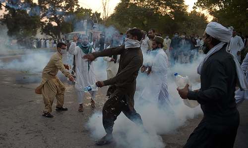 Islamabad police fire tear gas as protesters breach blockades outside Red Zone