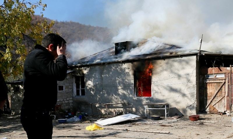 Armenians set fire to homes before handing village over to Azerbaijan