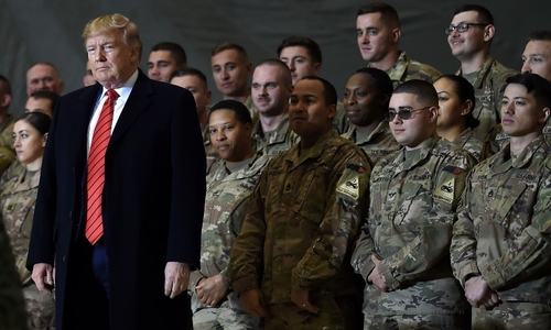 US to slash troop levels in Iraq, Afghanistan