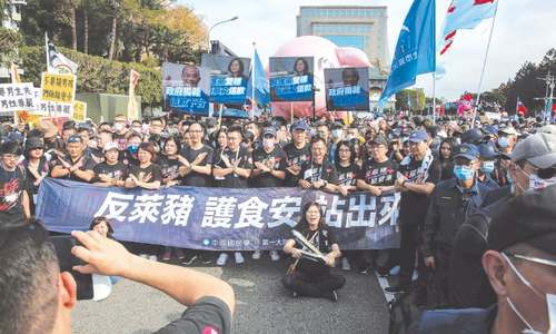 Thousands march in Taiwan against US pork imports Thousands march in Taiwan against US pork imports