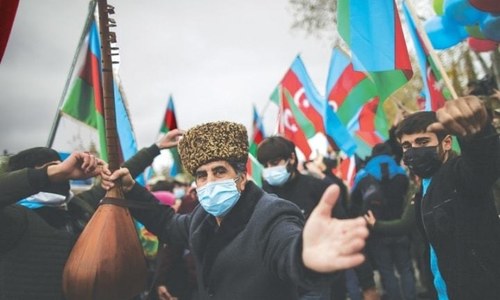 Azerbaijani troops hoist flag in district given up by Armenia under peace deal Azerbaijani troops hoist flag in district given up by Armenia under peace deal