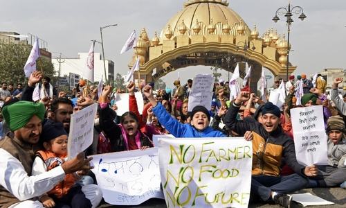 Farmers in India block railway tracks, roads in national action against new laws