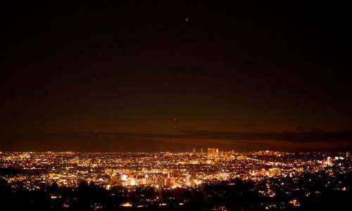 In pictures: Earthlings treated to rare alignment of Jupiter and Saturn