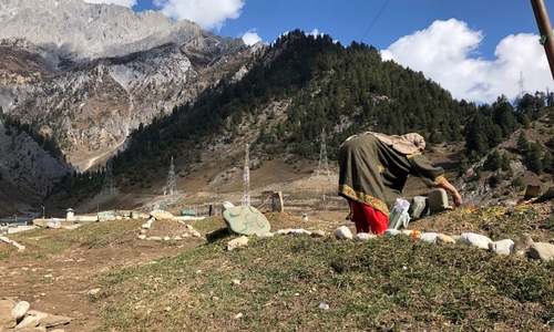 In Indian occupied Kashmir, empty grave for teenager killed by Indian forces