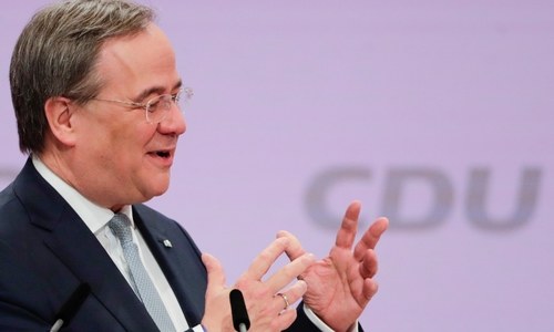 Merkel ally wins race to lead her party