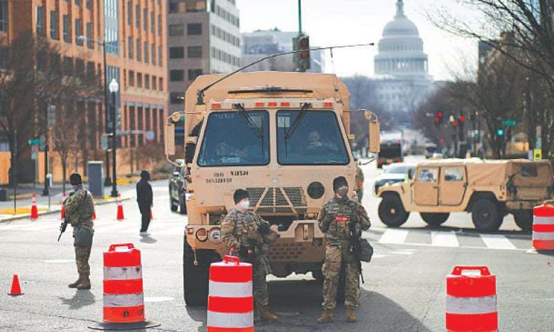 US state capitals on edge for armed protests as Trump presidency nears end