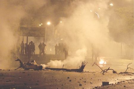 Riots break out in Tunisia as economy takes a hit
