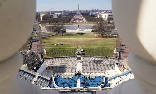 Washington on lockdown and on edge as Biden set to take helm in few hours