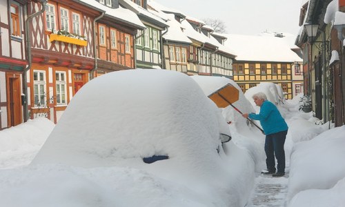 Snow and bitter cold bring chaos to Germany, Britain