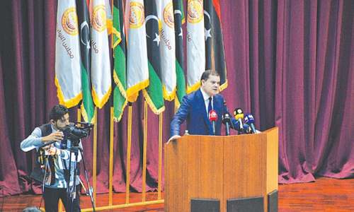 Libyan lawmakers approve interim govt in key step towards elections