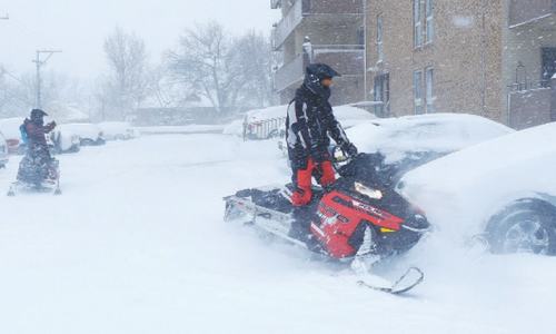 Three US states dig out from powerful snowstorm