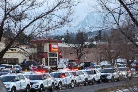 Gunman kills 10, including police officer, at supermarket in US