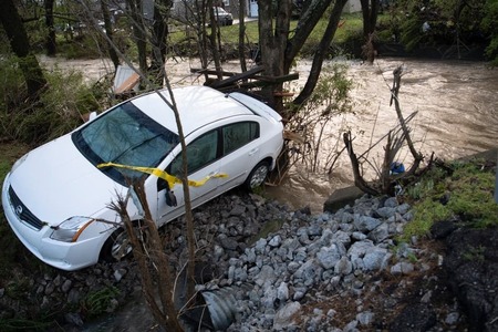 Four killed as record rains cause flooding in US state