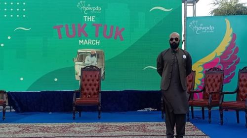 What is the Tuk Tuk March and why did celebrities take part in it?