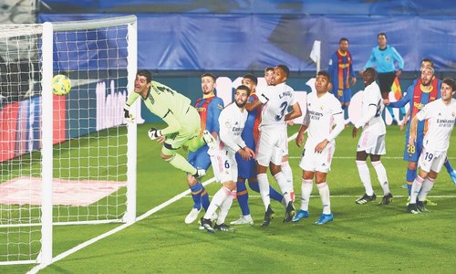 Relentless Real beat Barca to go top Relentless Real beat Barca to go top