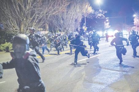 Tensions grip US city as police shoot dead African American